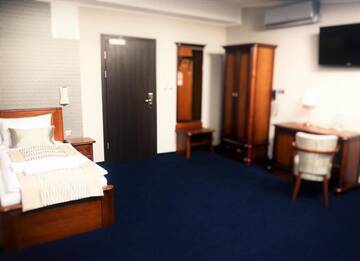 Фото номера Трехместный номер Отель Hotel Kamienica г. Ополе 9